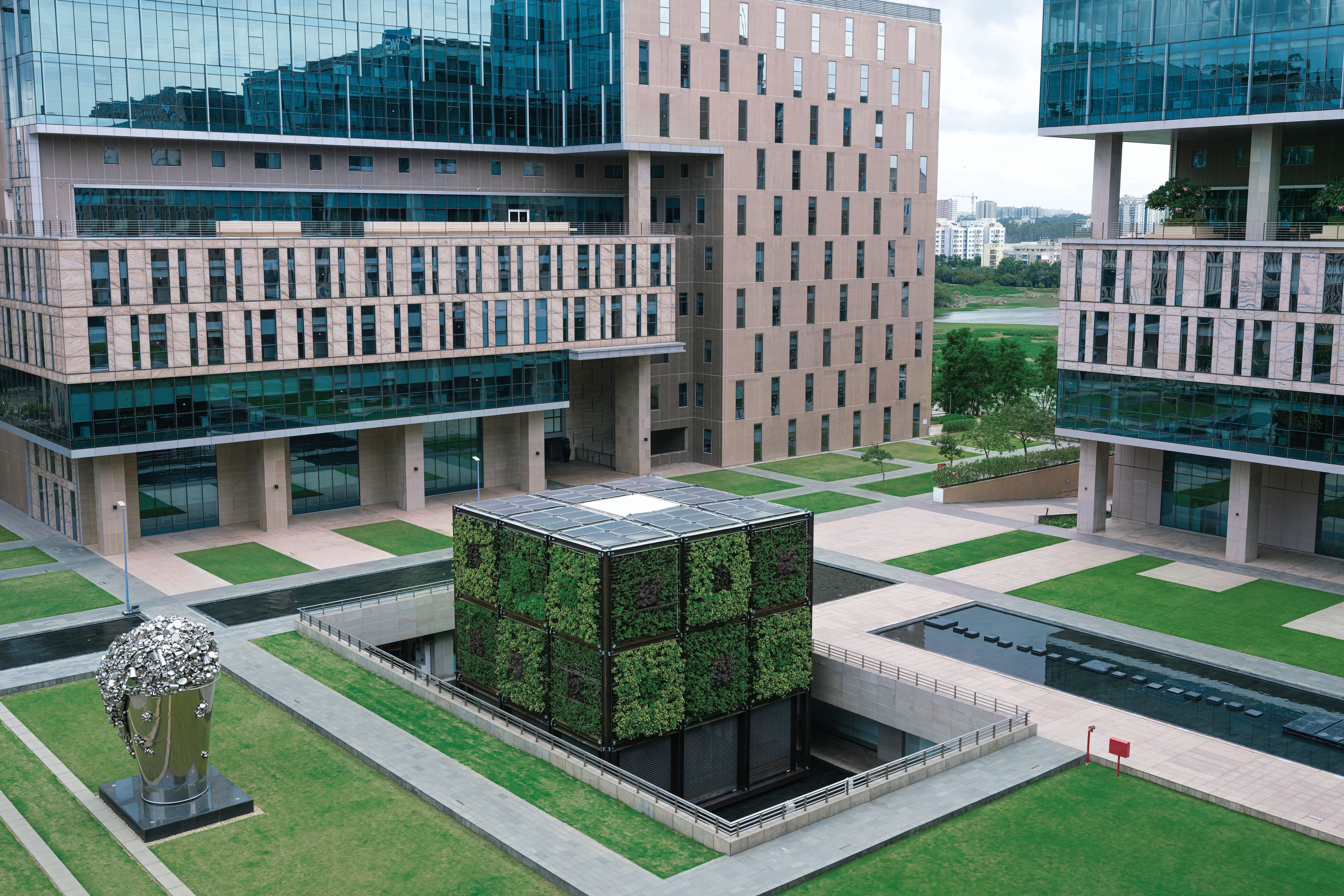 Modern office building exterior, glass and steel architecture, business district, Mumbai, India.