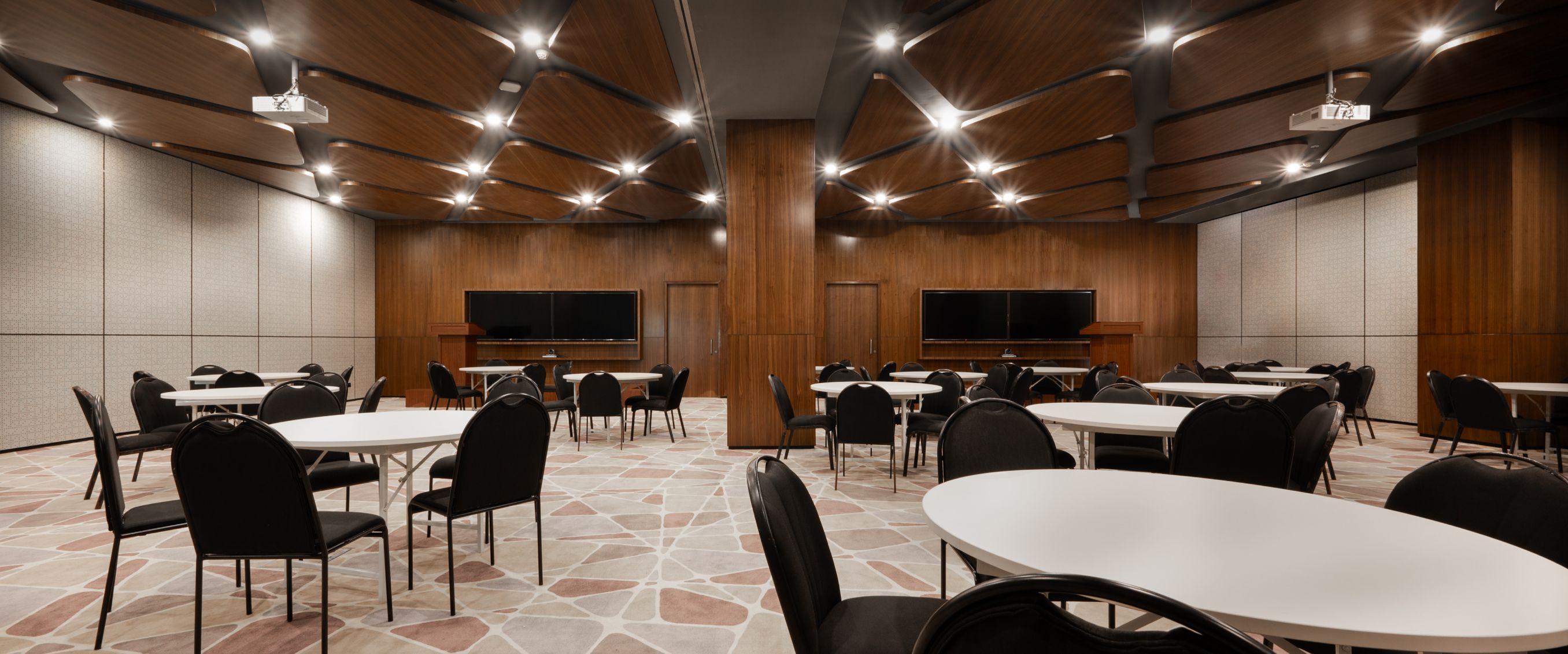 Modern lobby with seating area and natural light in a commercial building.