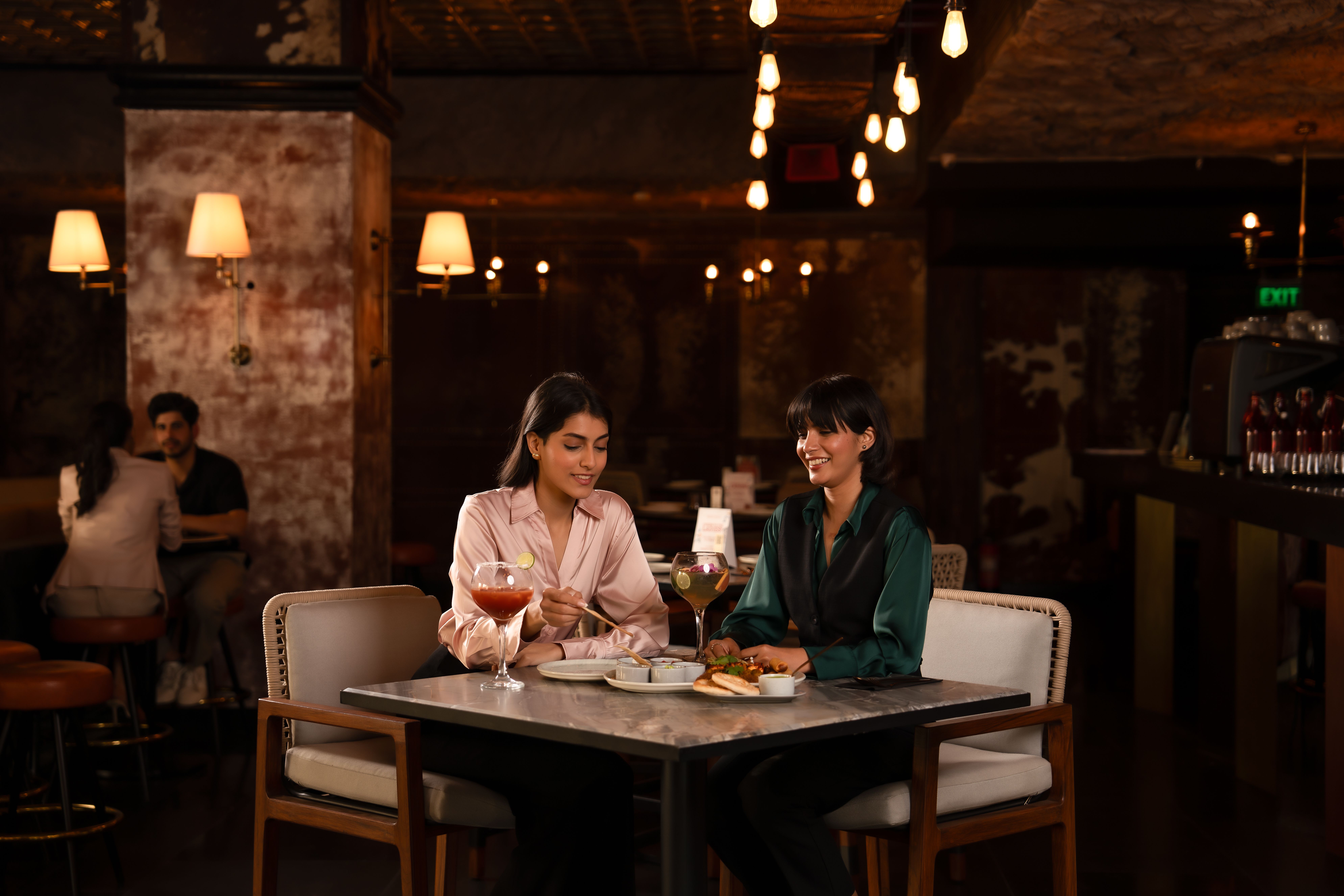 Upscale restaurant interior with modern design and comfortable seating.