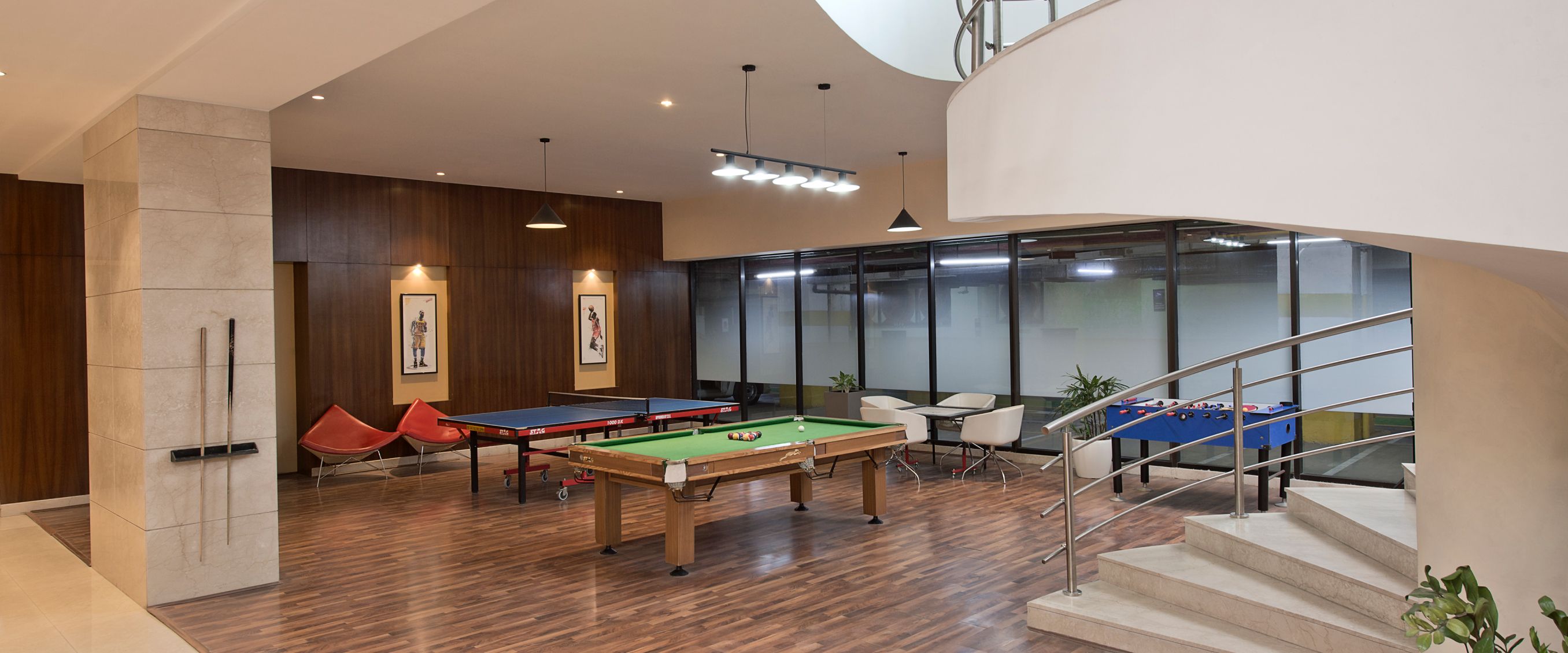 Modern office building exterior, glass and steel architecture, commercial real estate, Brookfield India REIT.