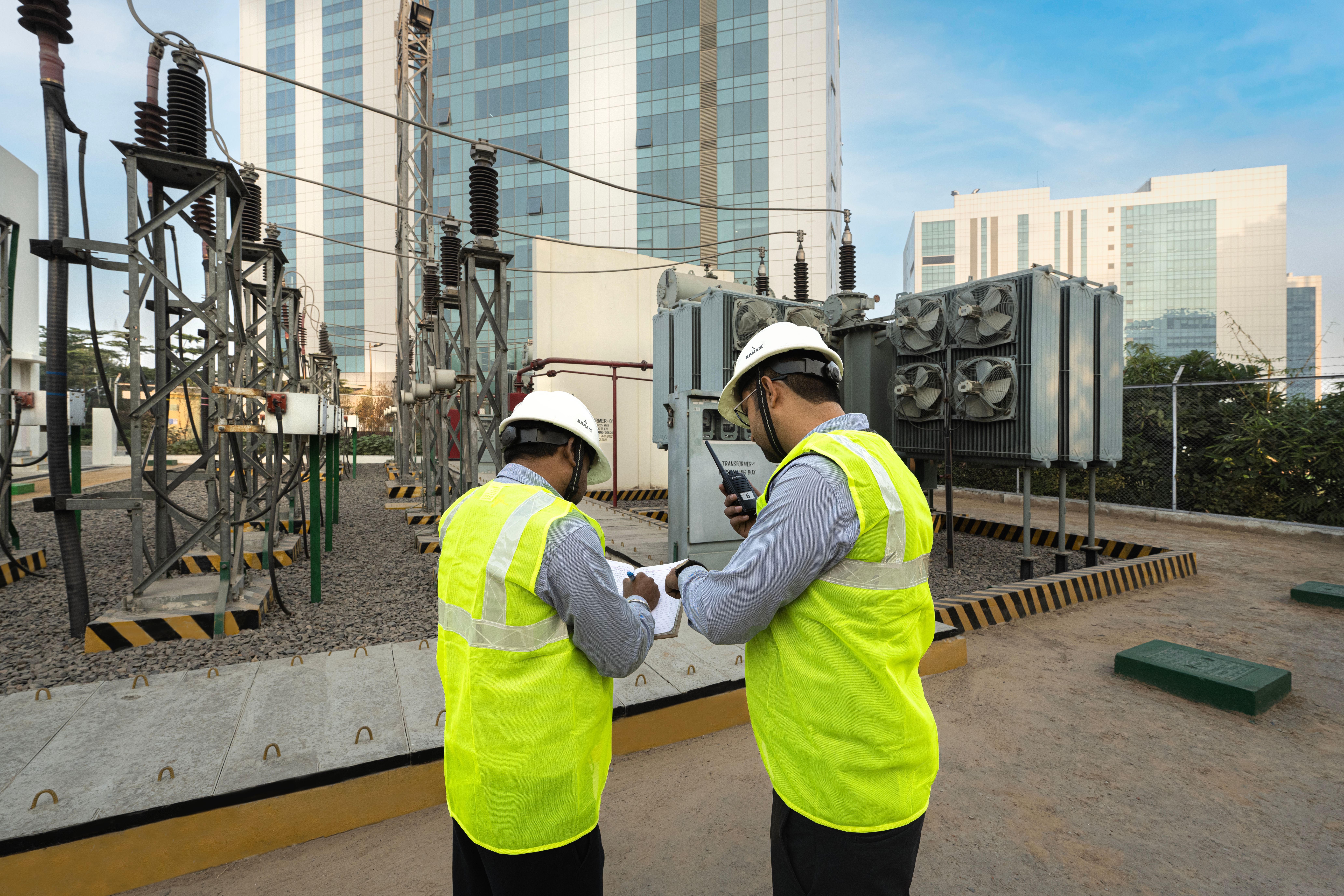 Power substation with transformers and electrical equipment, supporting commercial real estate.